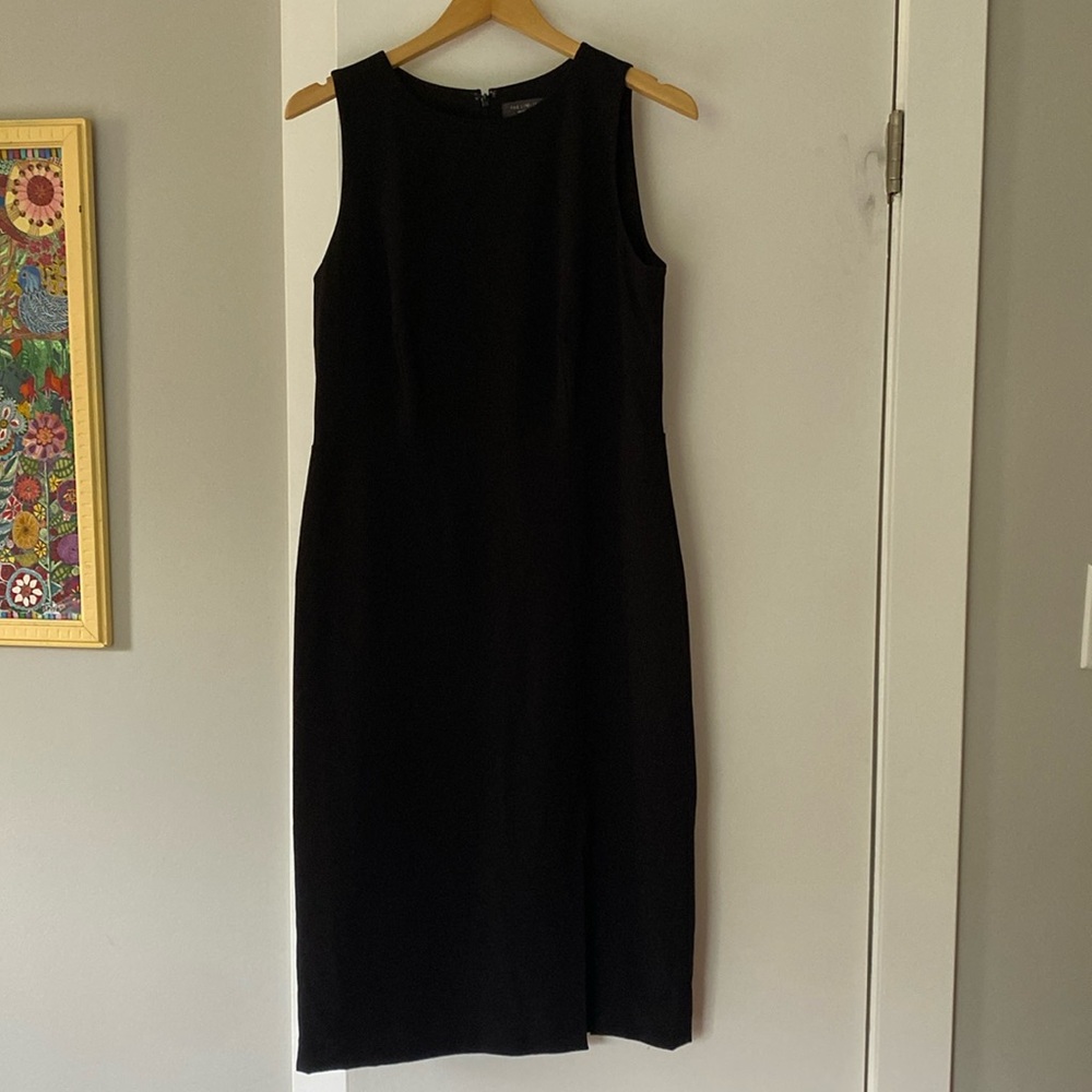 The limited black dress with slit size 10